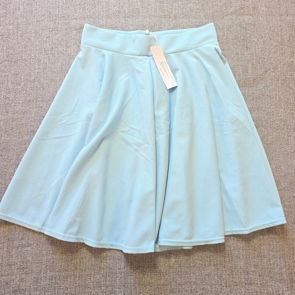 Urban Coco Dresses & Skirts - Urban Coco Baby Blue  Circle Tail Short Skirt NWT Size Medium Stretch